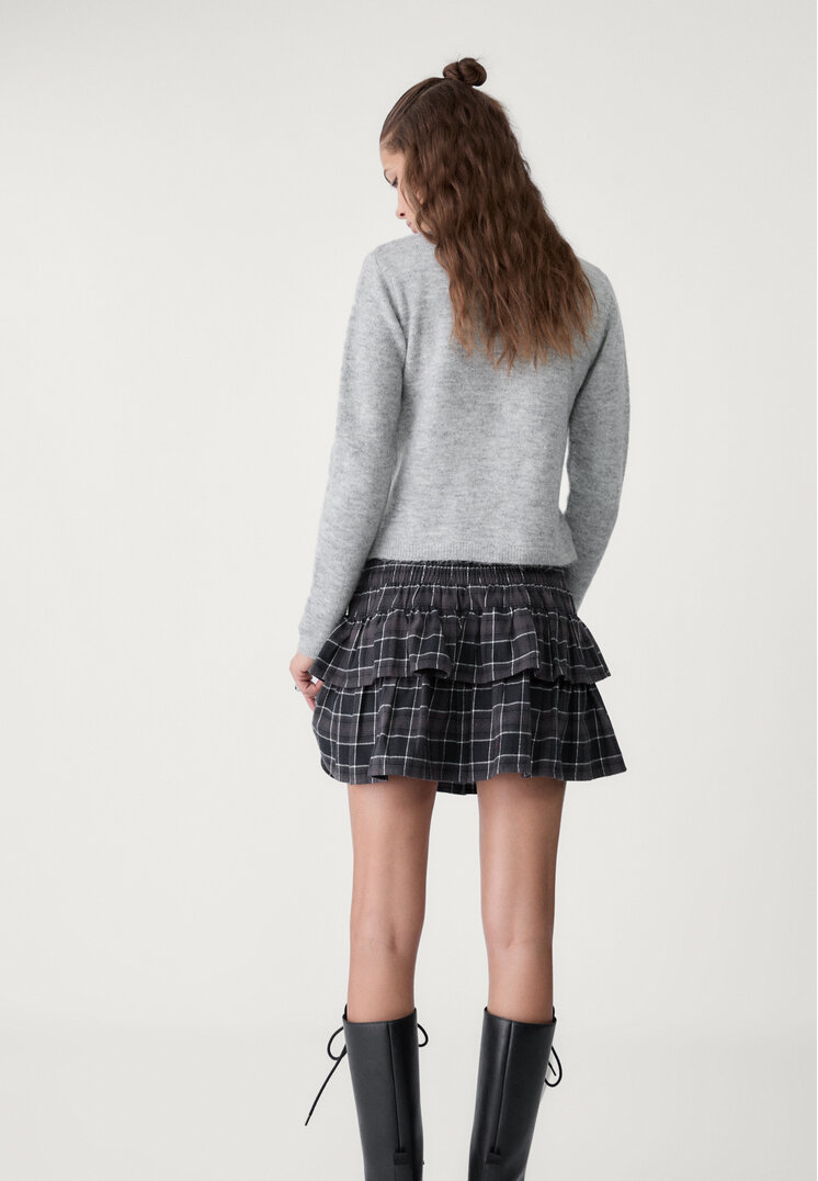 chaqueta botones punto