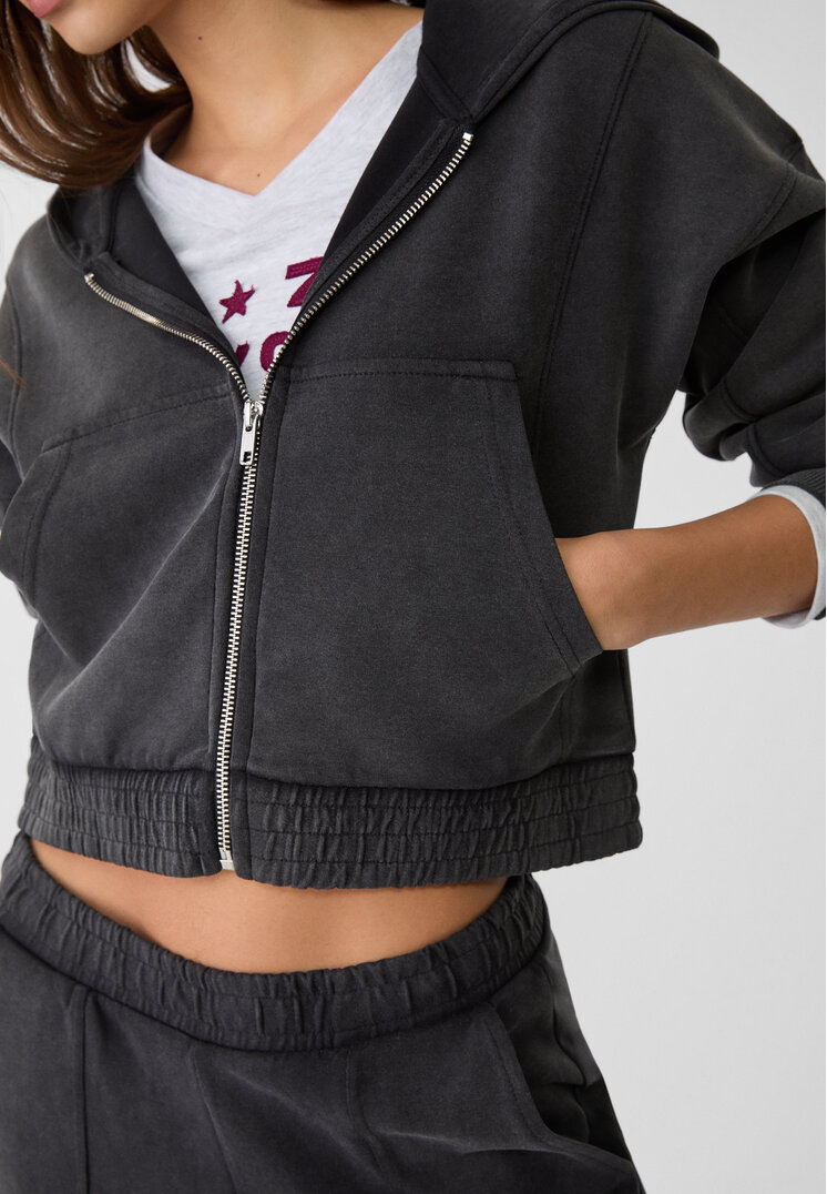 sudadera capucha bolsillos