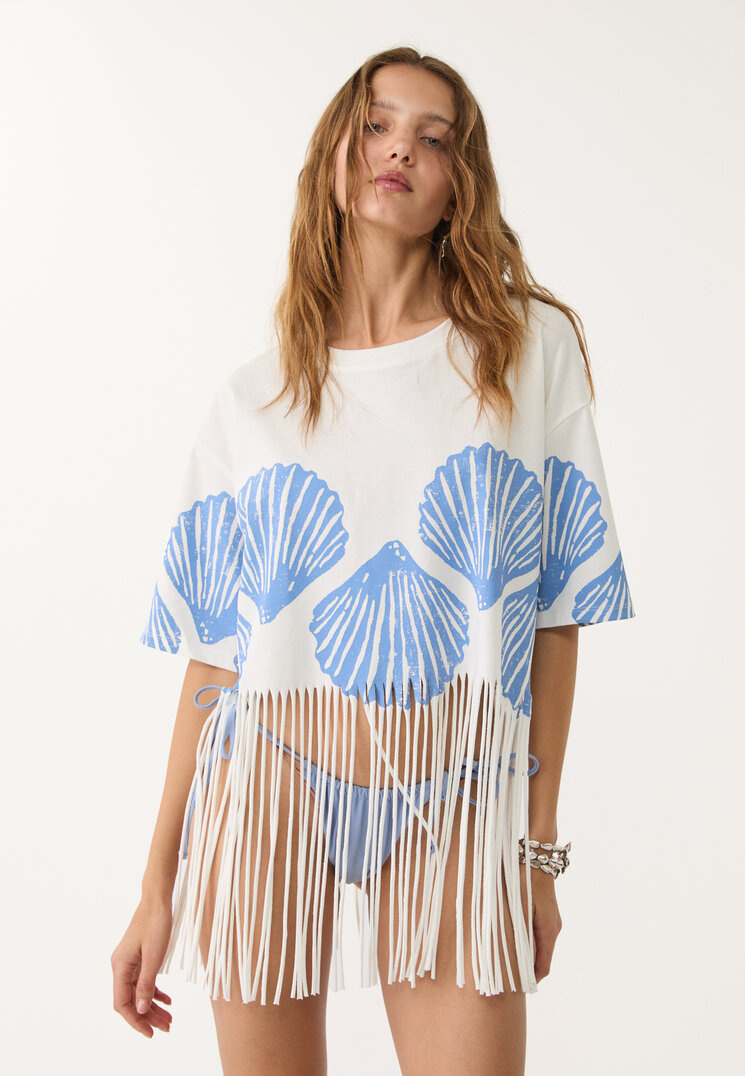 camiseta flecos conchas
