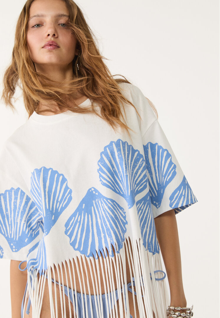 camiseta flecos conchas