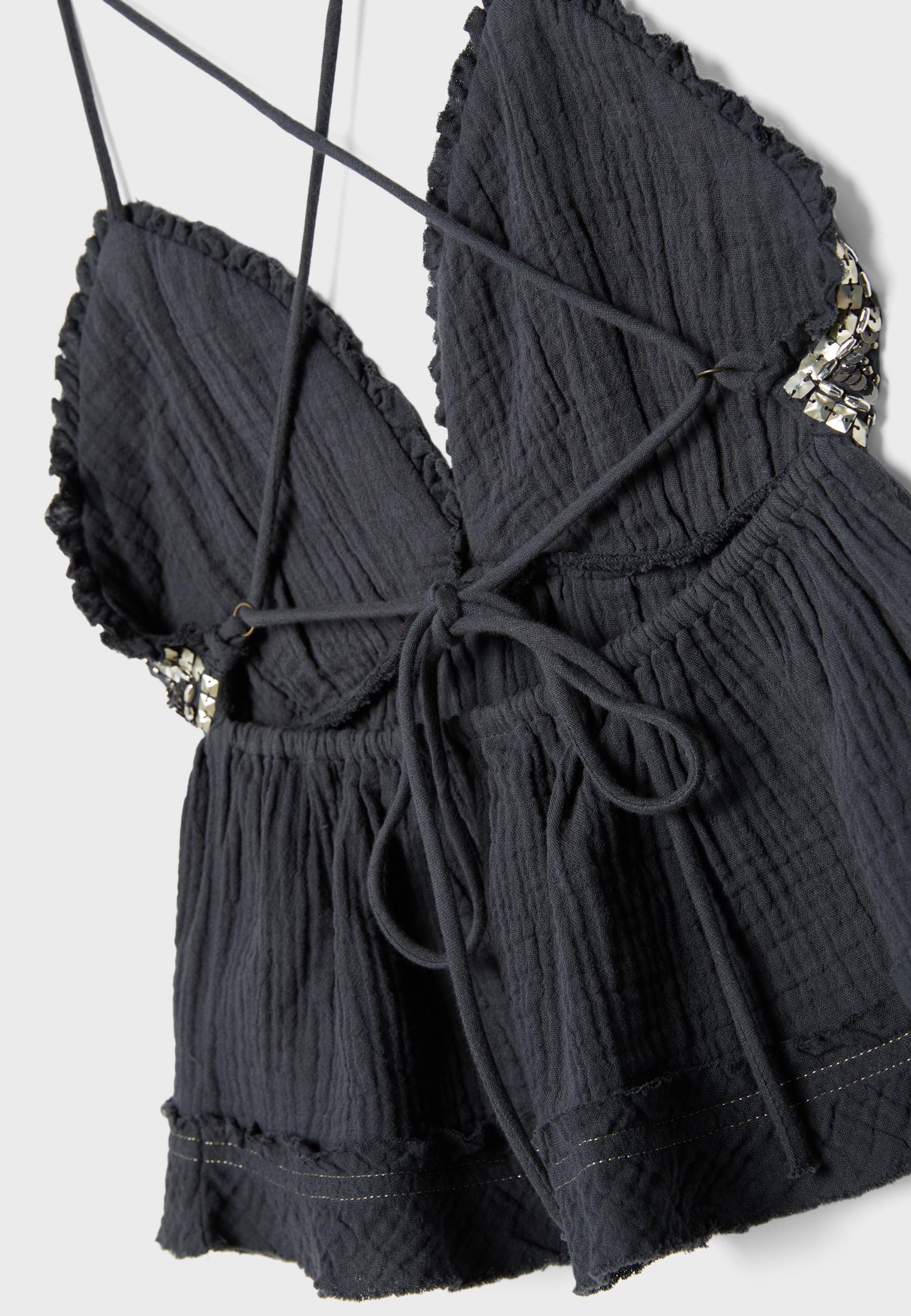 Ruffled and beaded top — Dark grey
