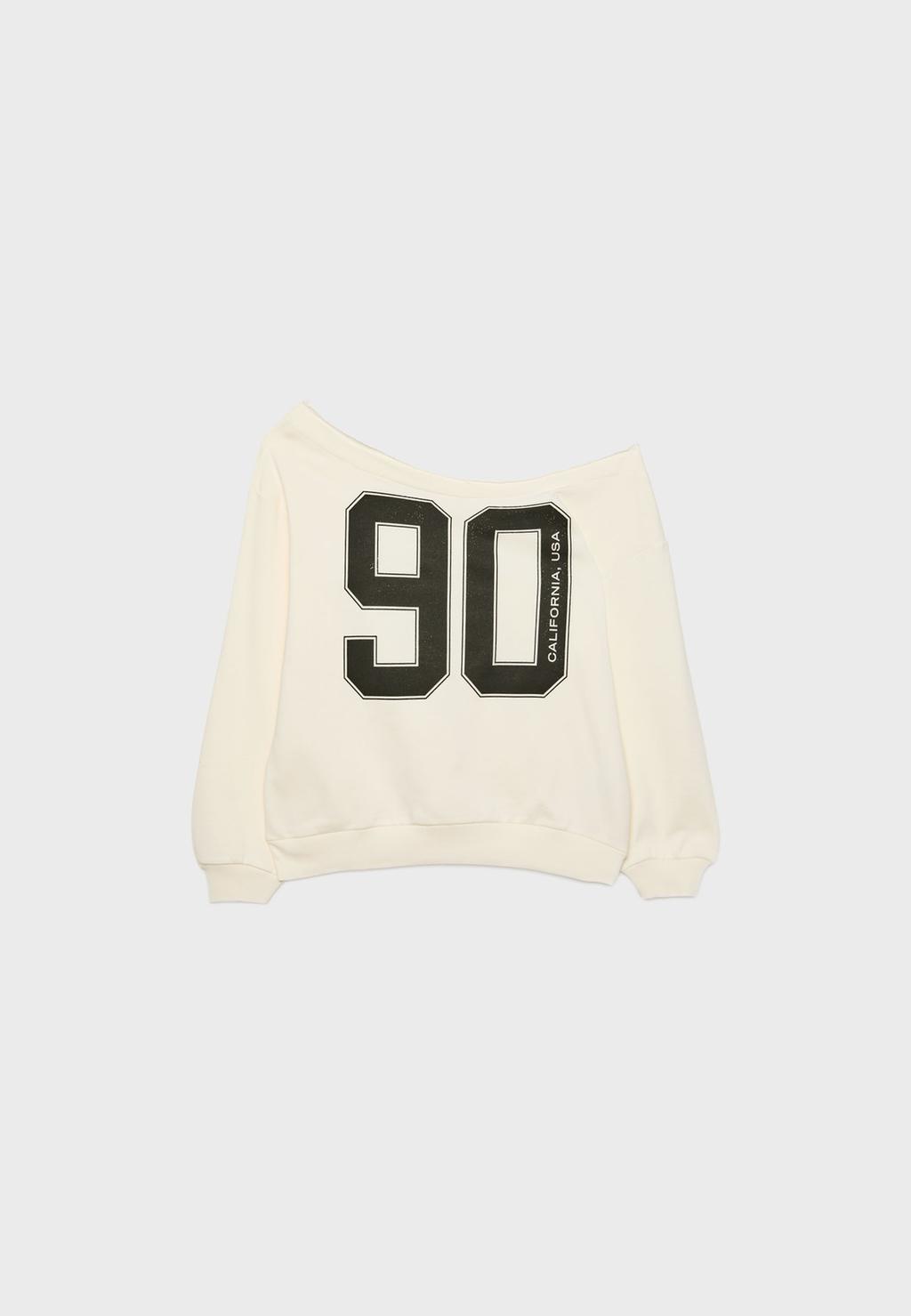 Sudadera posicional hombro descubierto