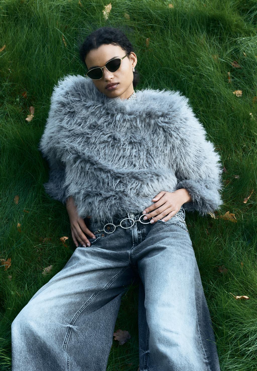 Collarless faux fur jacket