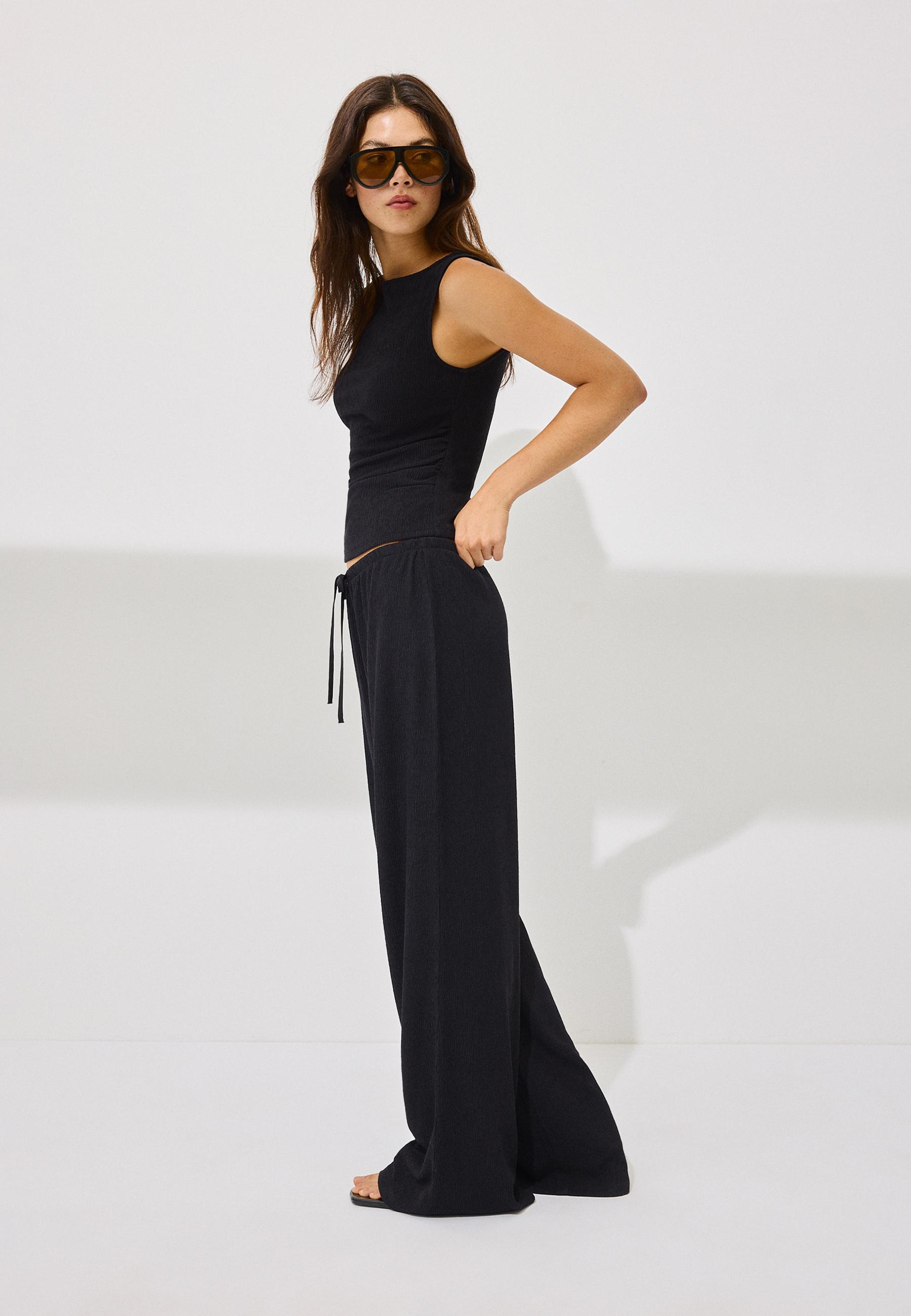 Straight-leg creased-effect trousers — Black