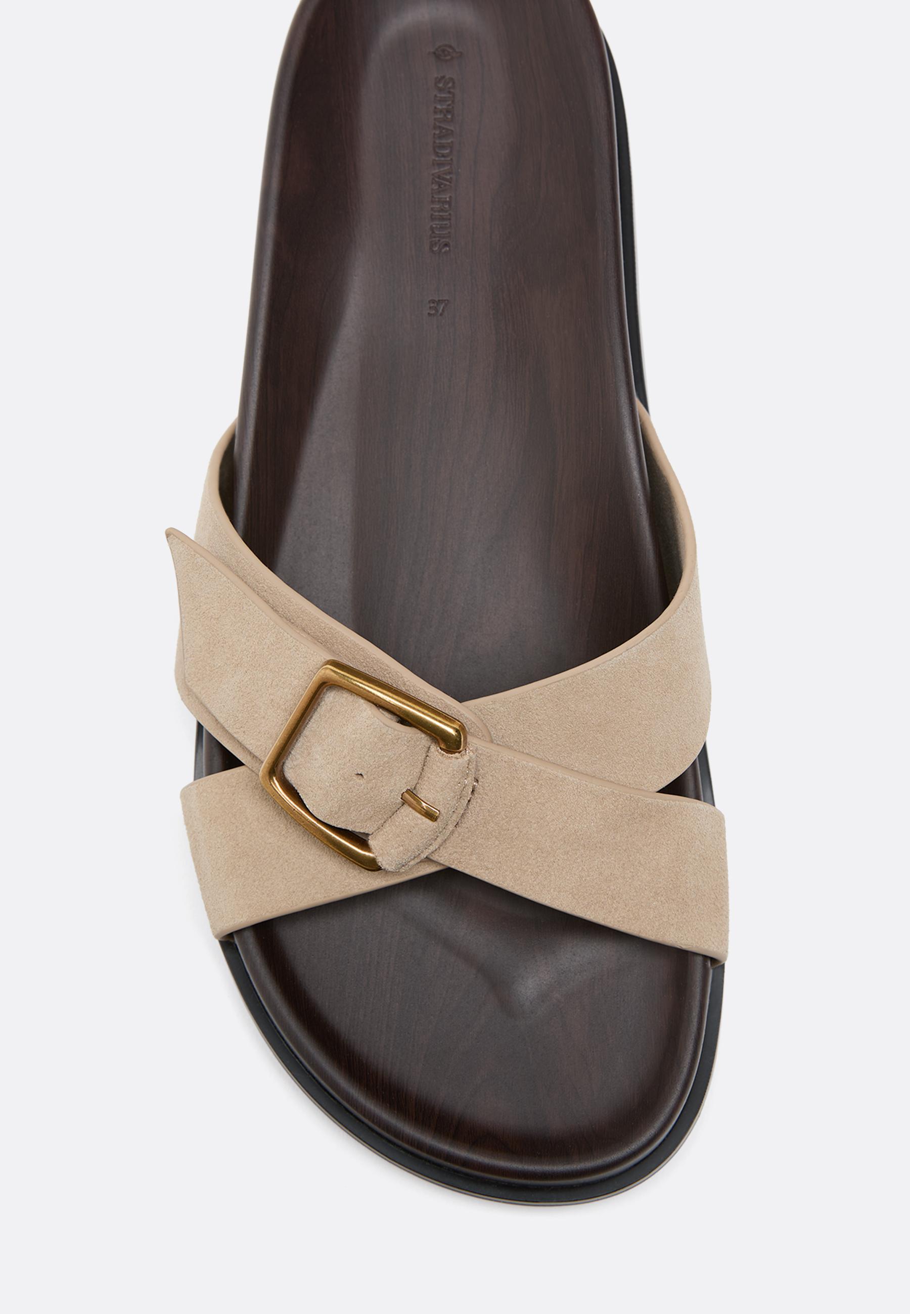 Flat crossed leather sandals — BEIGE