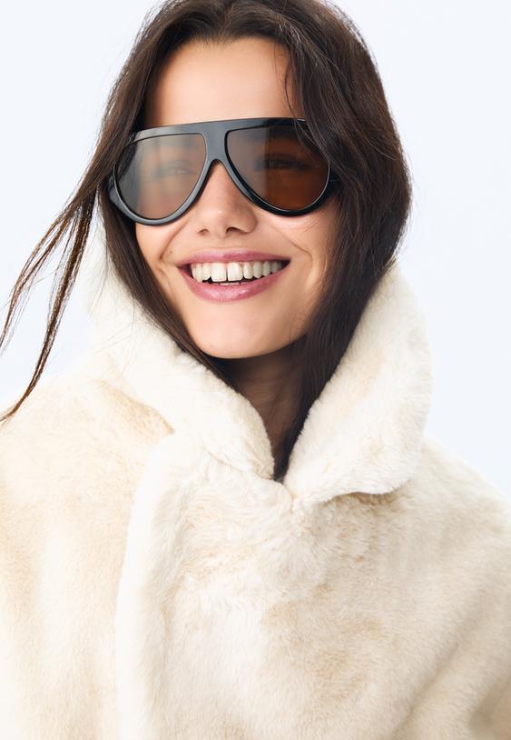 gekreuzte-jacke-mit-kunstfell