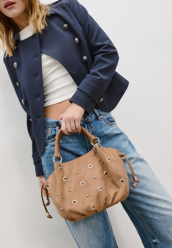 bolso bandolera redonda detalle eyelets