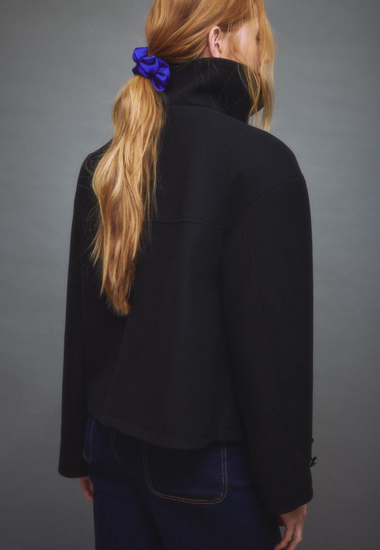 cazadora cruzada cuello alto efecto suave