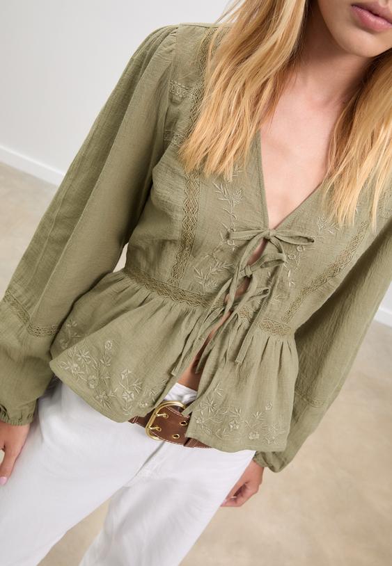 loose fitting embroidered knot blouse