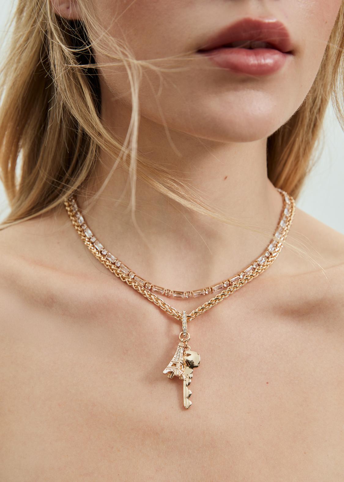 Set of rhinestone and multi-charm necklaces