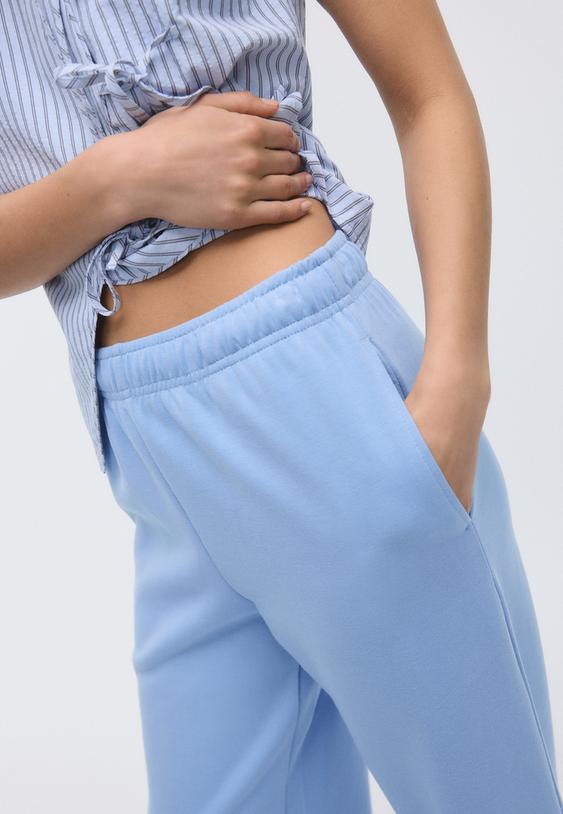 calcas jogger de perna larga