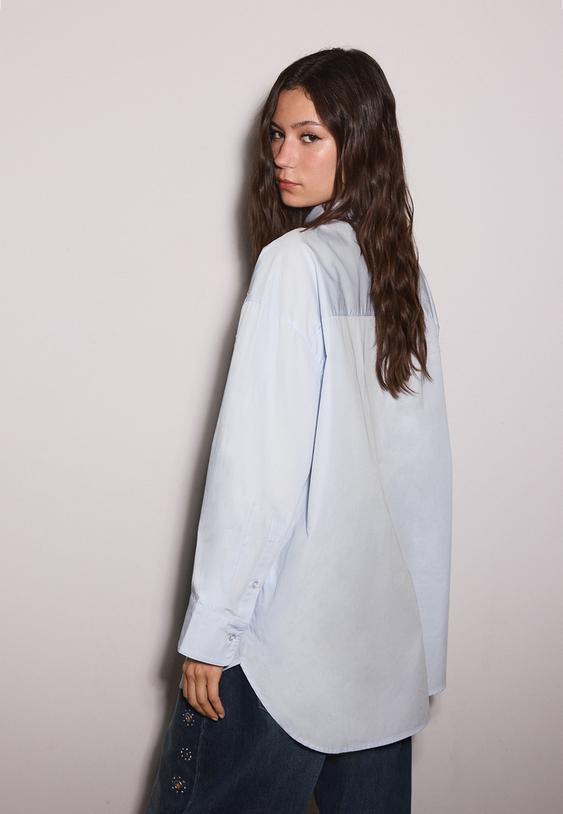 camicia oversize con borchie