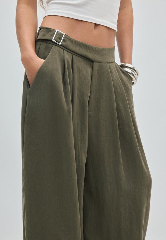 calcas estilo bombachas com fivela