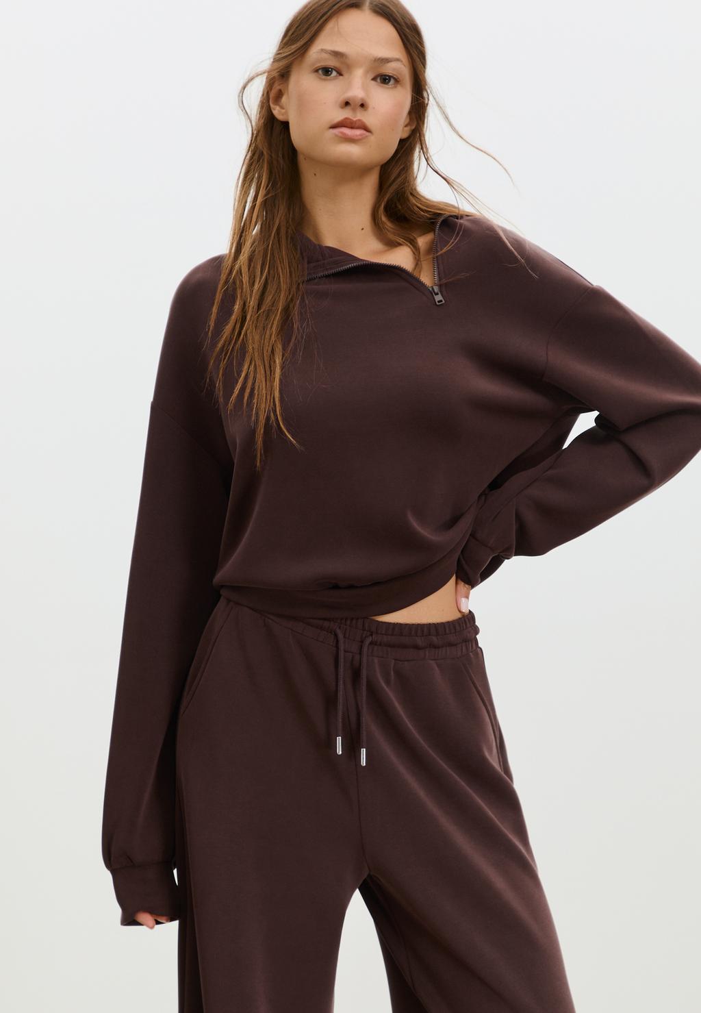 Sudadera cremallera lateral tacto suave