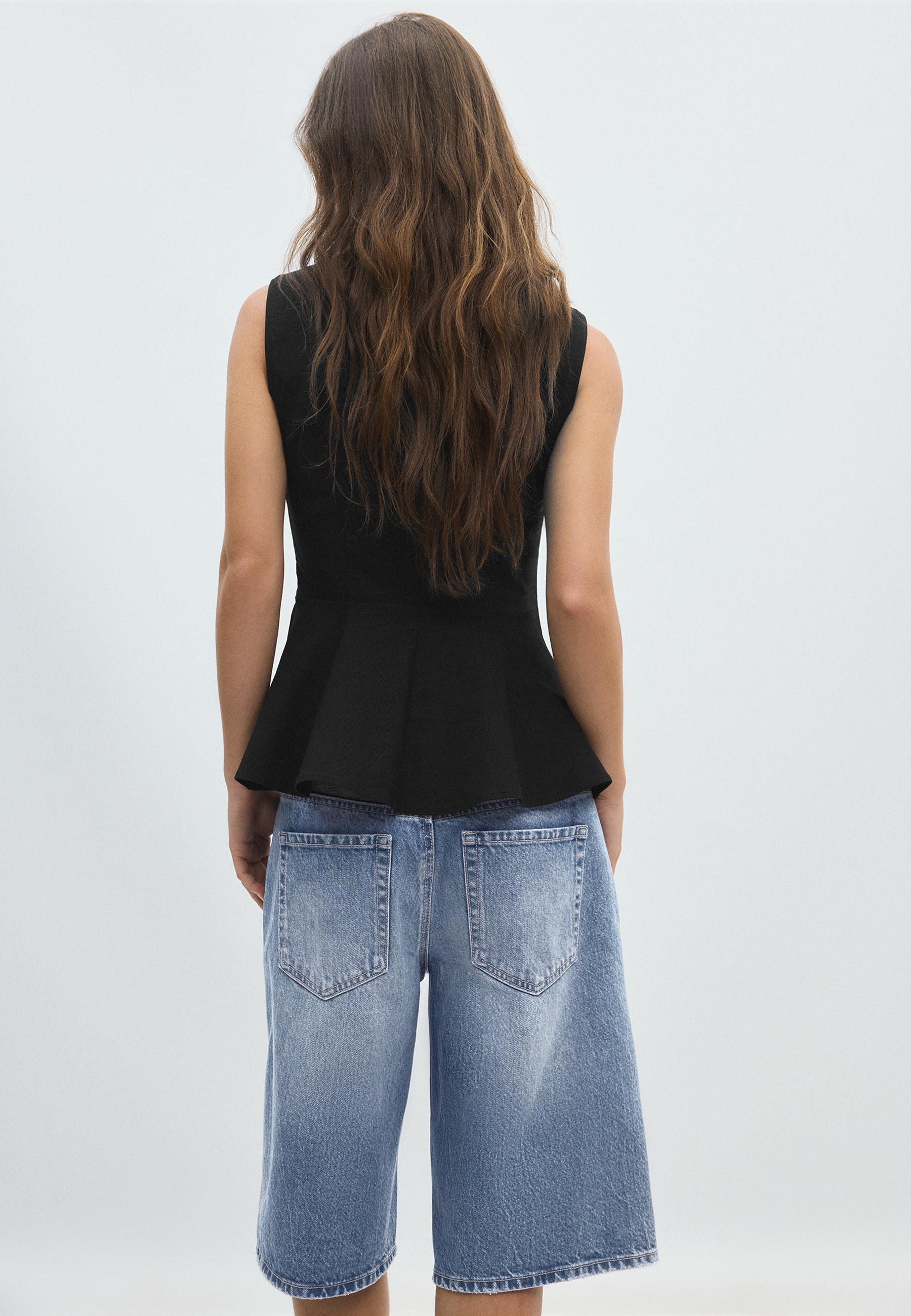Sleeveless high-neck peplum top — Black