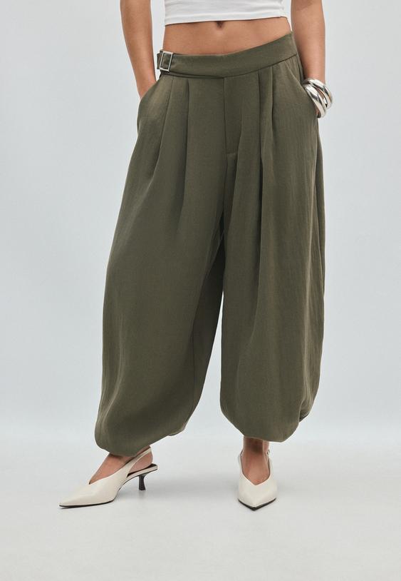 calcas estilo bombachas com fivela