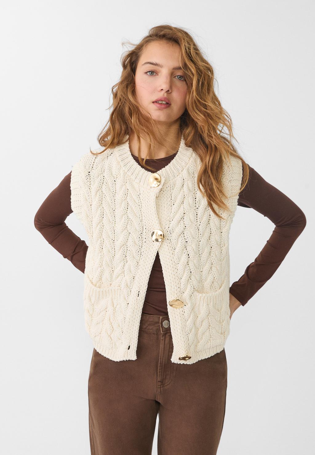 Cable-knit vest with golden buttons