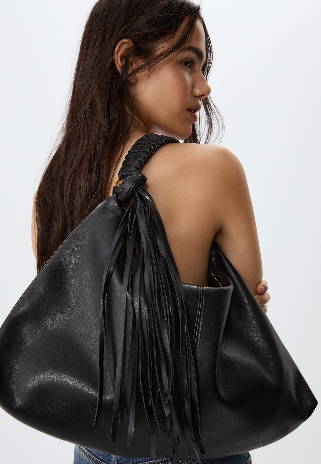 Borsa con frange e manico intrecciato Moda da donna