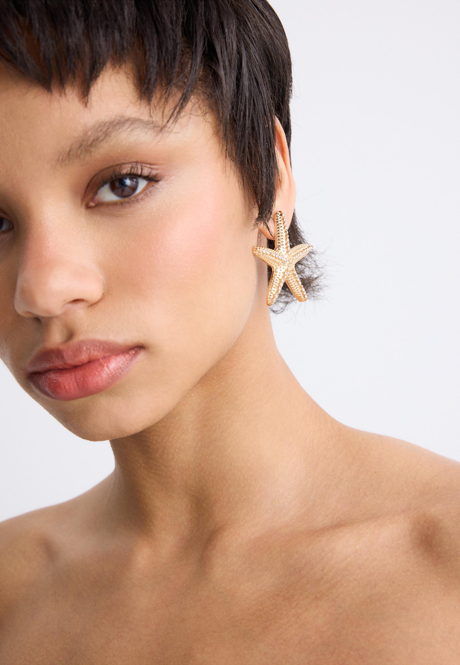 Starfish earrings — Gold