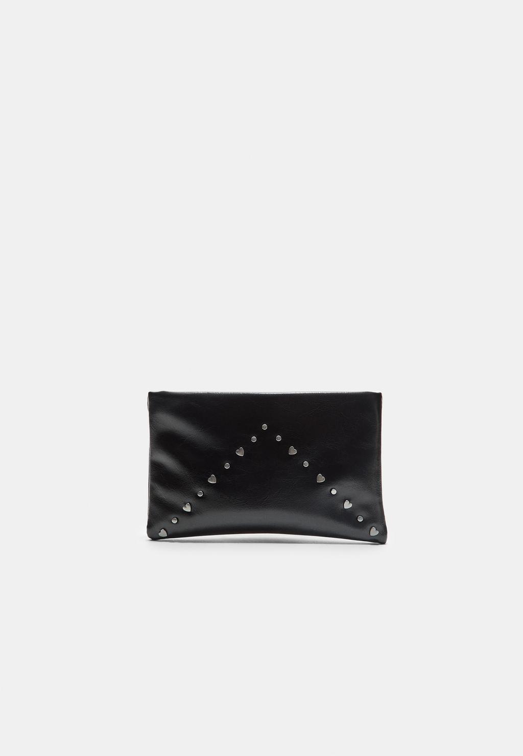 Beauty case in finta pelle con borchie a cuore