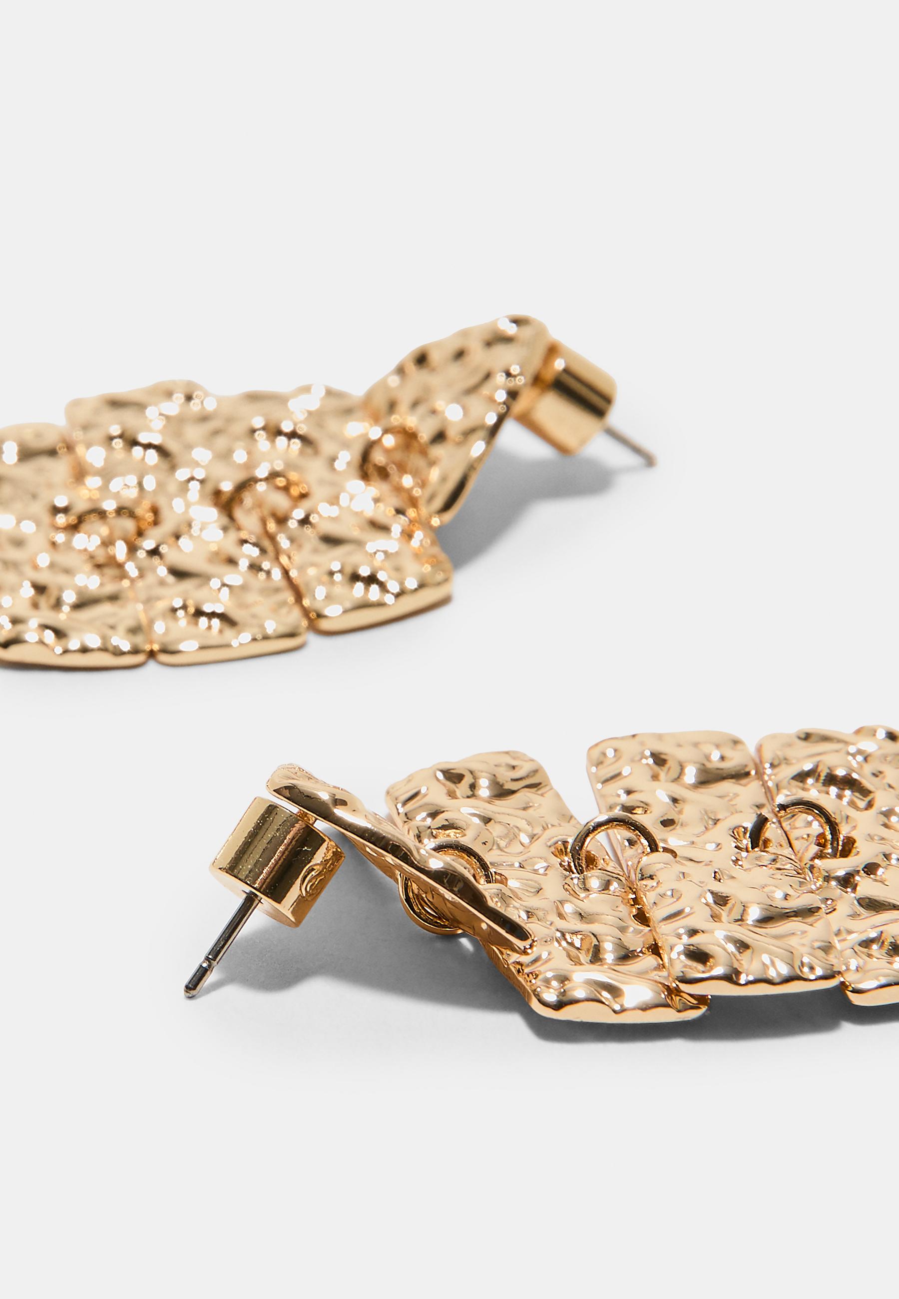 Articulated fish earrings — Gold