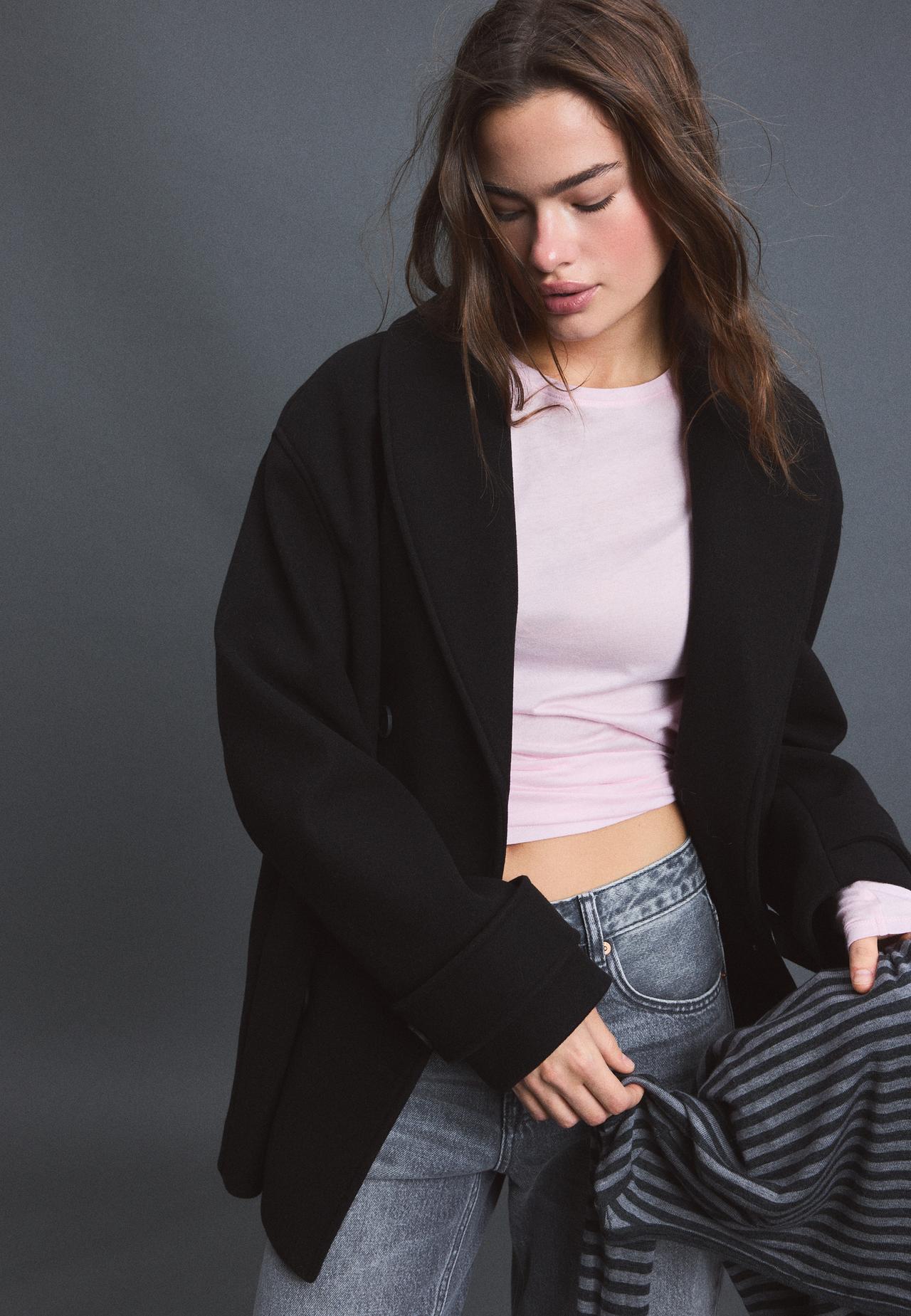 Soft-touch crossover high neck jacket — Black
