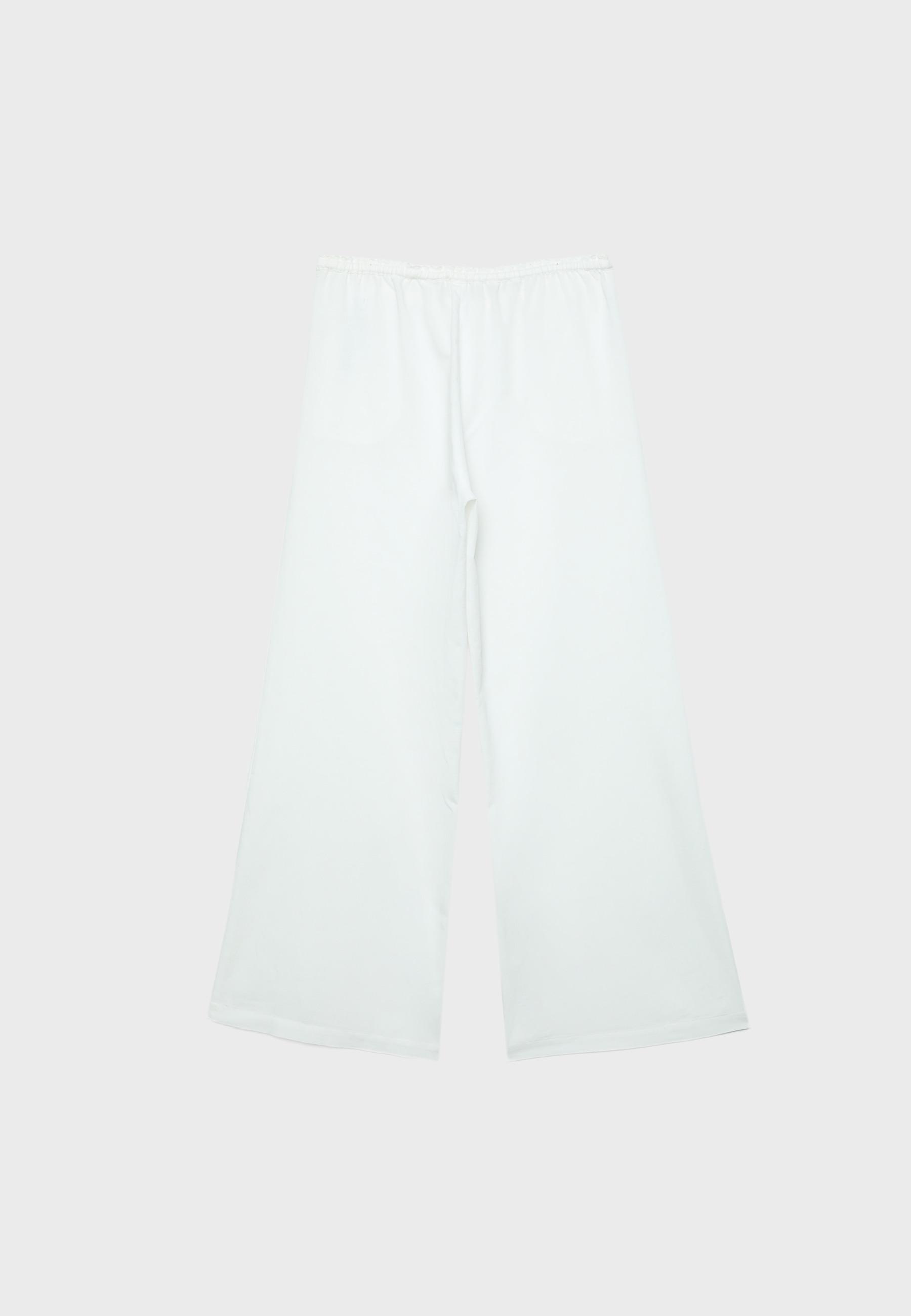 Wide-leg linen-effect trousers — Ecru
