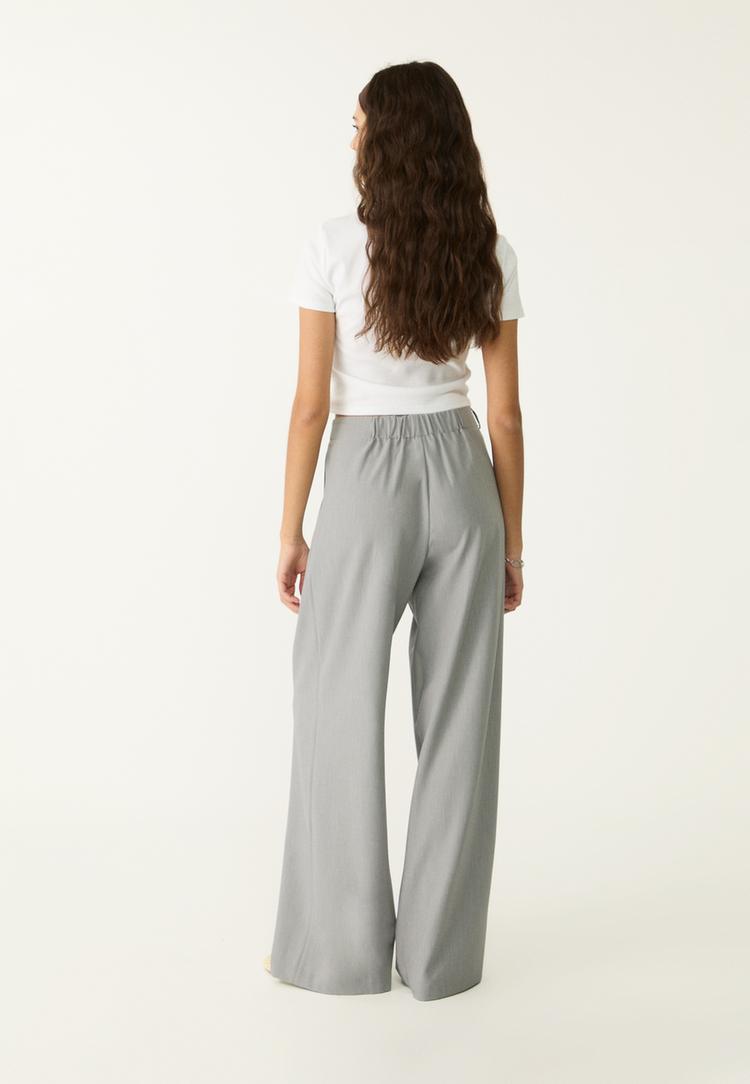pantalon vestir ancho detalle hebilla
