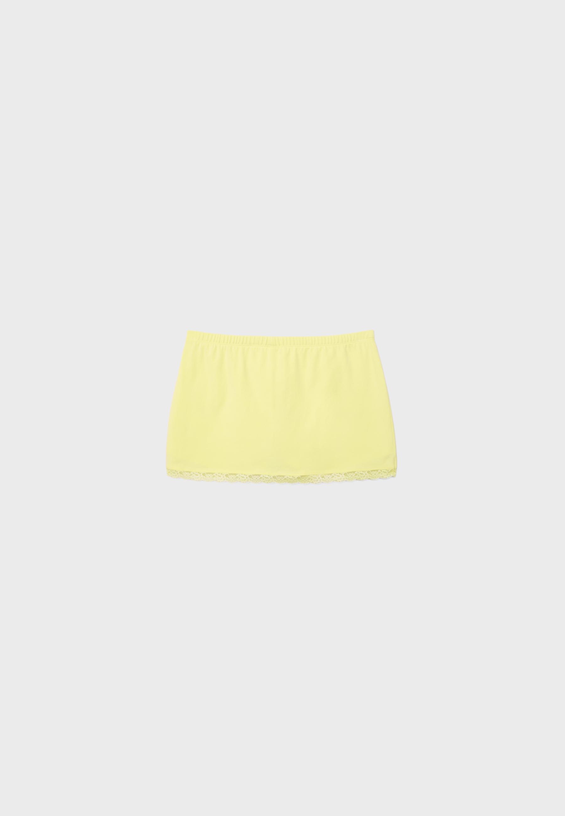 Lace trim mini skort — Pastel yellow