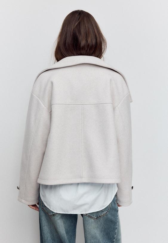 cazadora cruzada cuello alto tacto suave