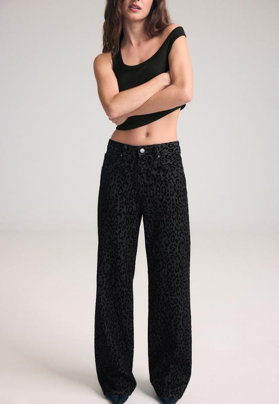 jeans stampa floccata leopardata