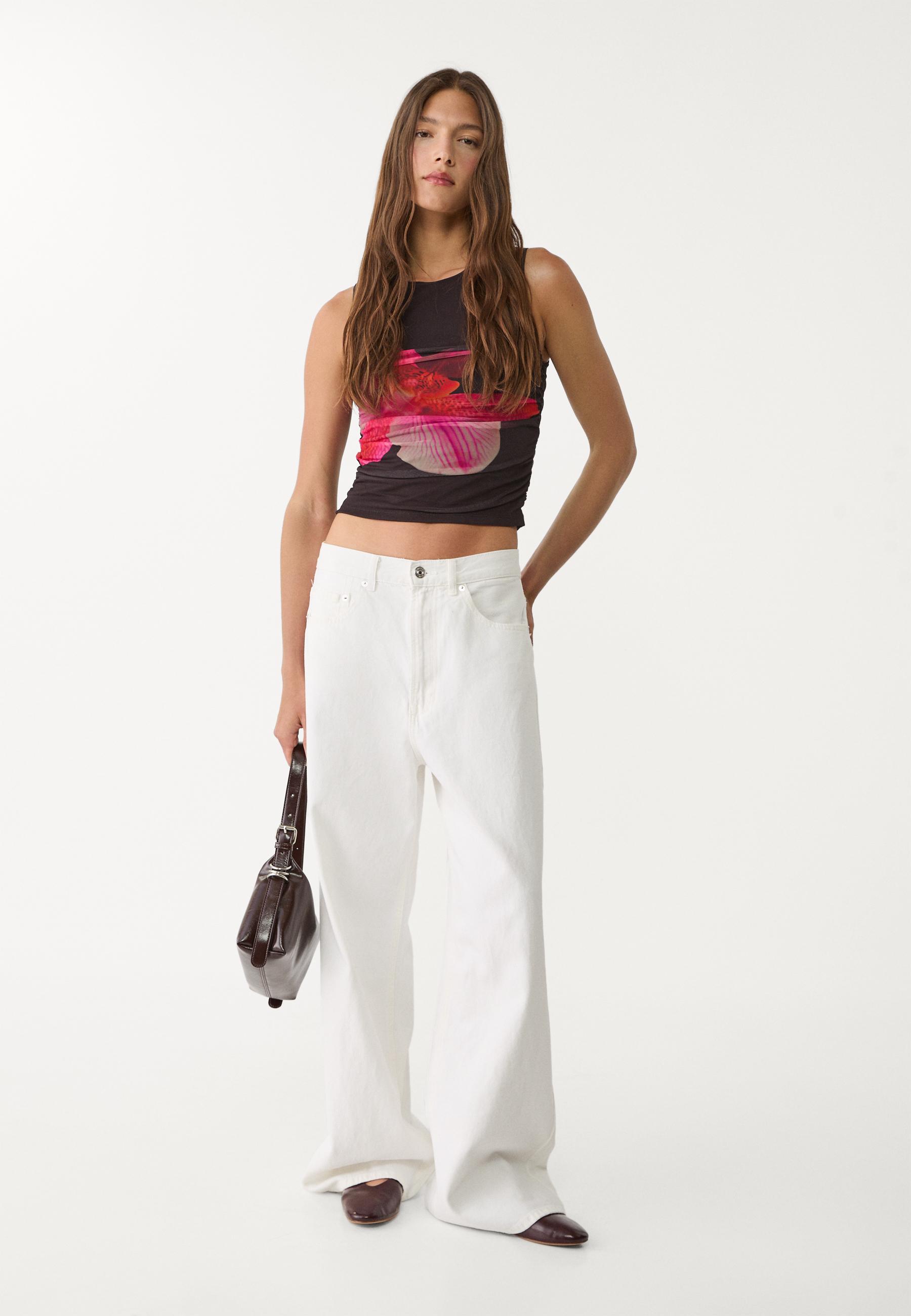 Tulle top with hibiscus details - Women's fashion