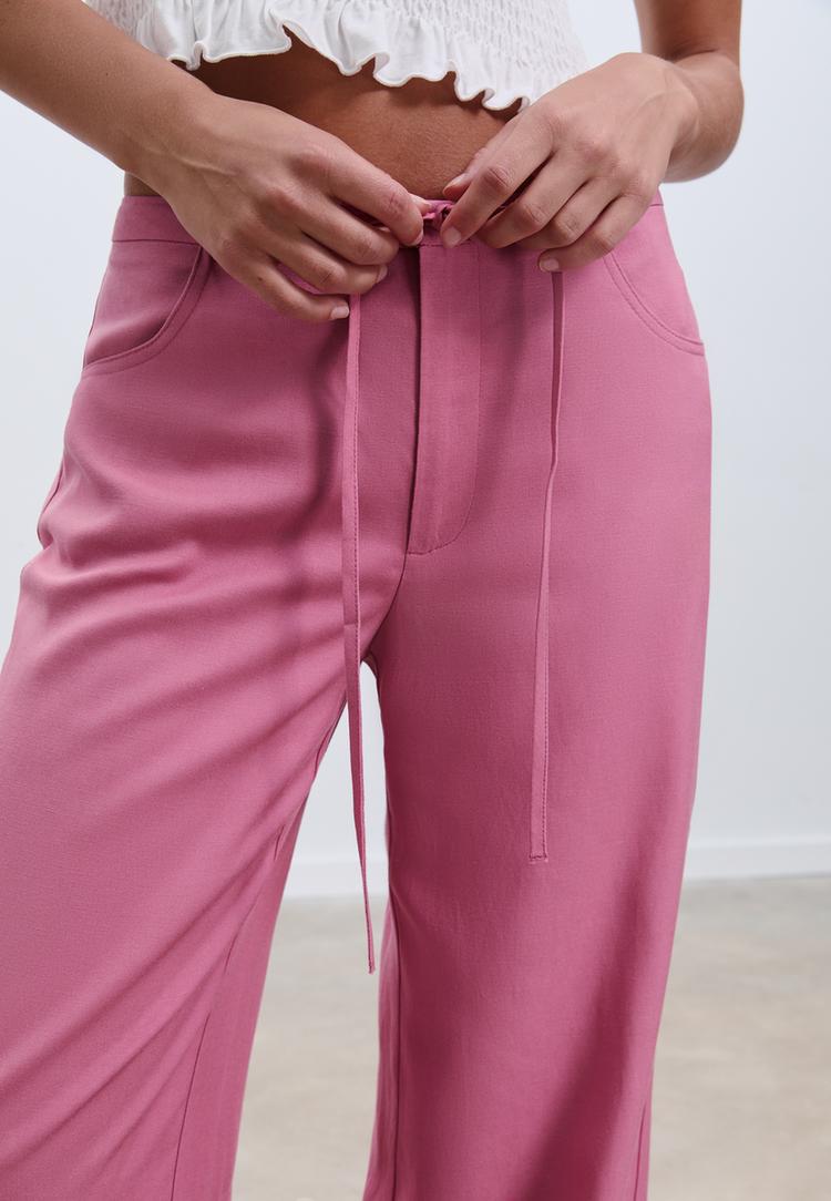 pantalon fluido bolsillos