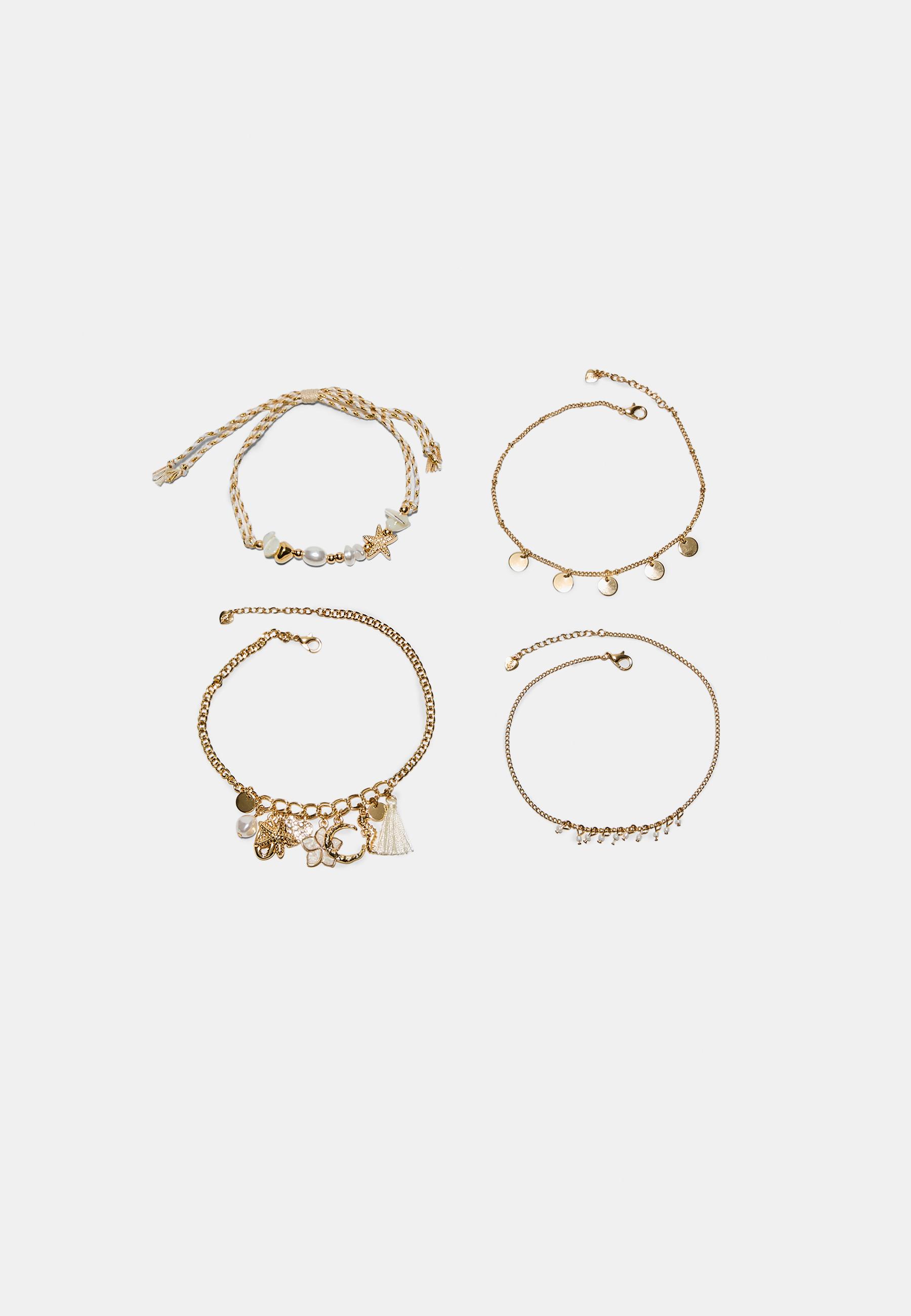 Set of 4 charm anklets — Gold