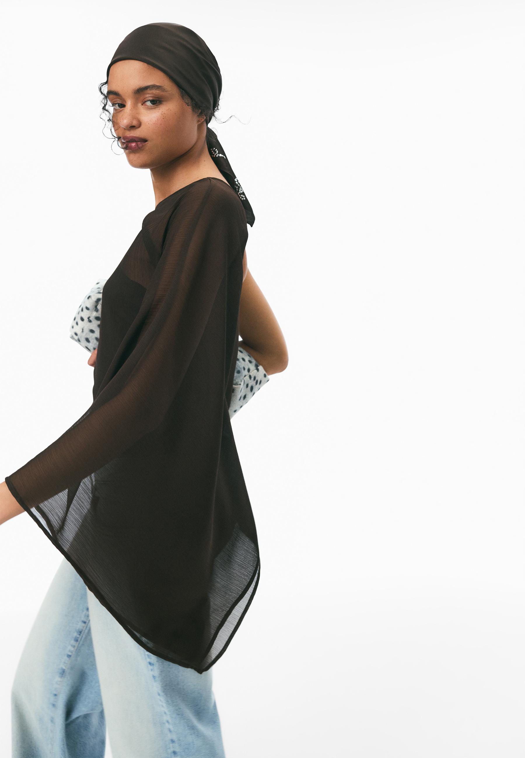 Asymmetric cape — Brown