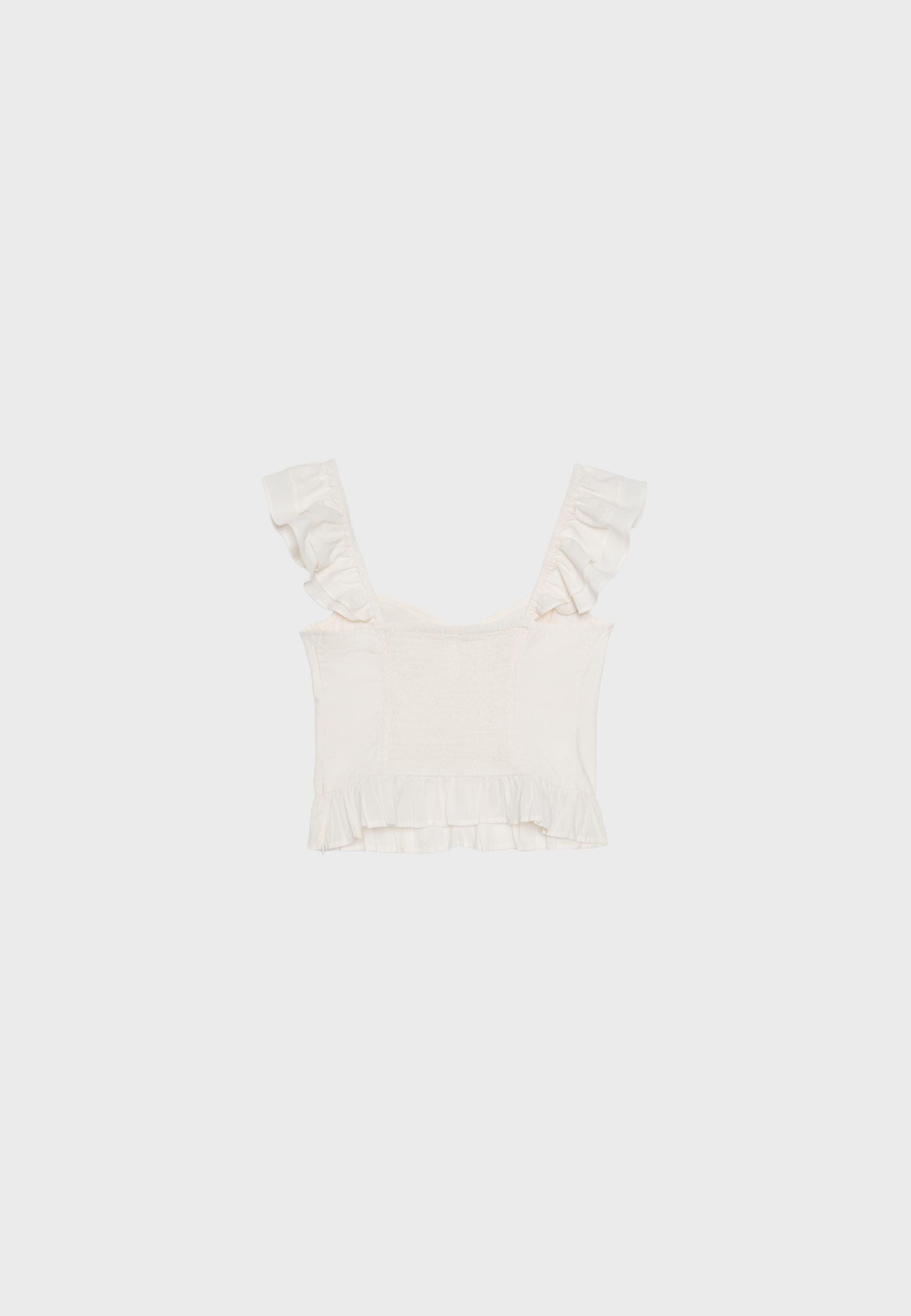 Ruffled corsetry-inspired top — Ecru