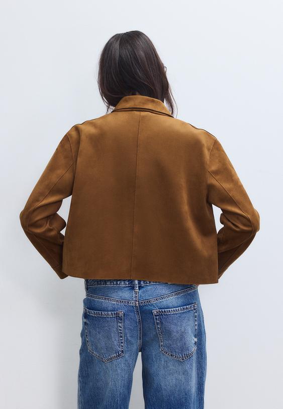 giubbotto con tasche effetto camoscio