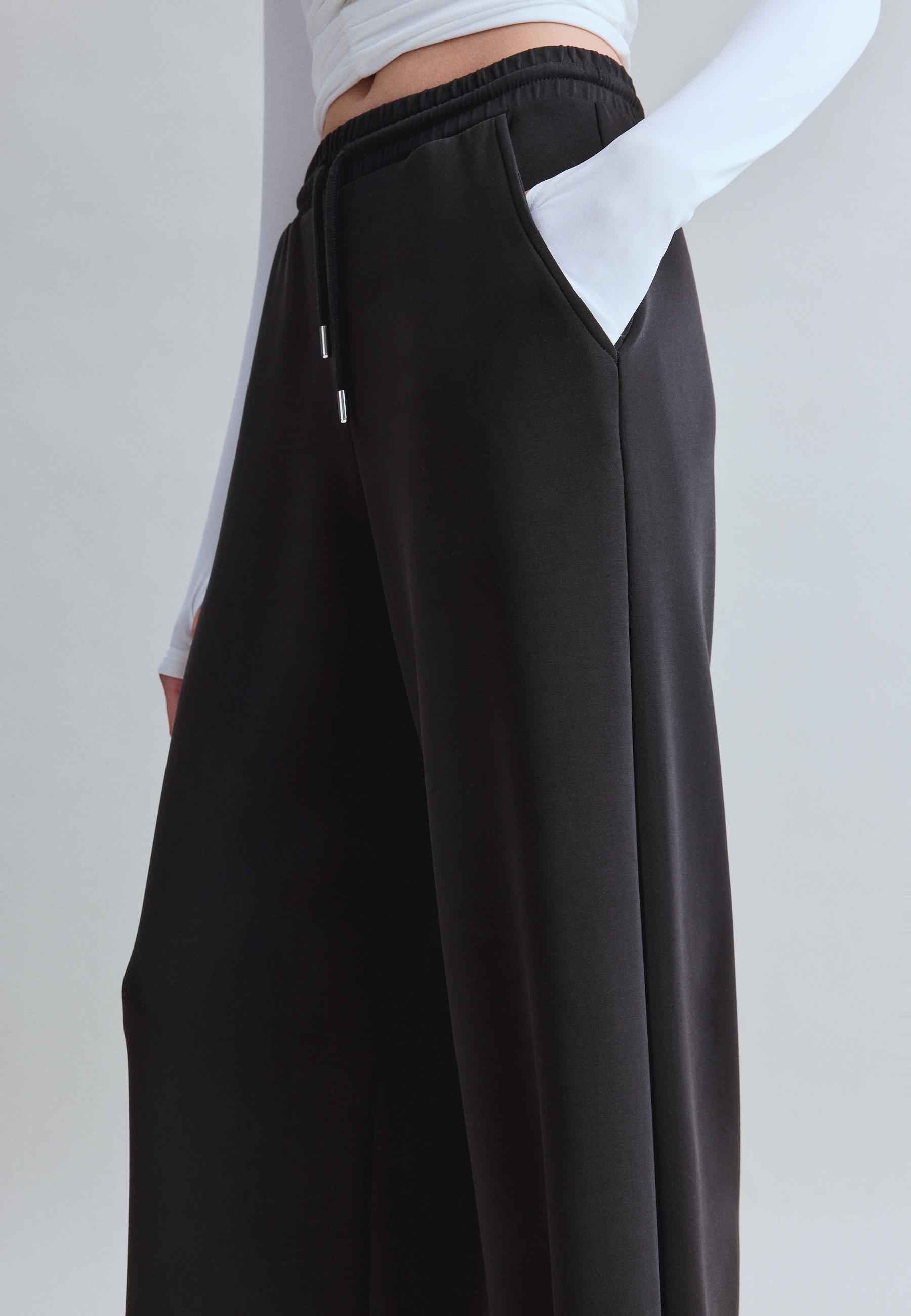 Soft-touch palazzo joggers — Black