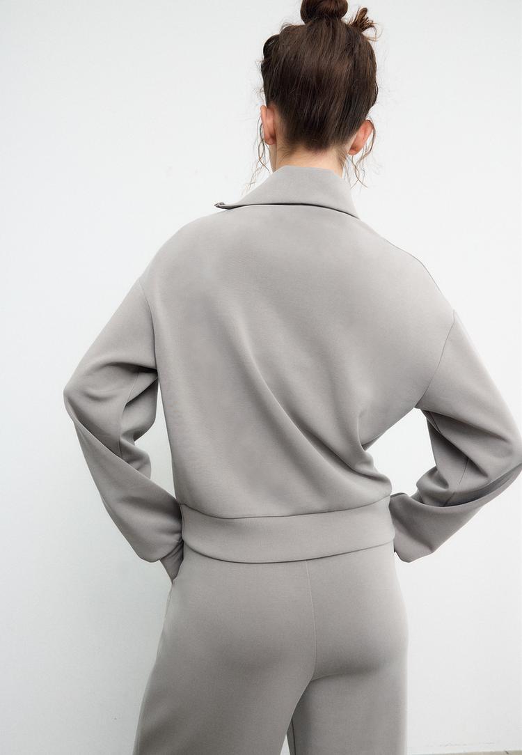 sudadera cremallera lateral tacto suave