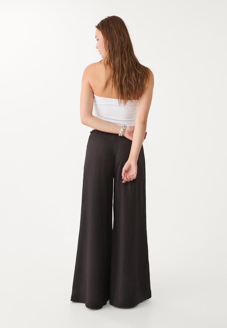 pantalon palazzo fluido con lino