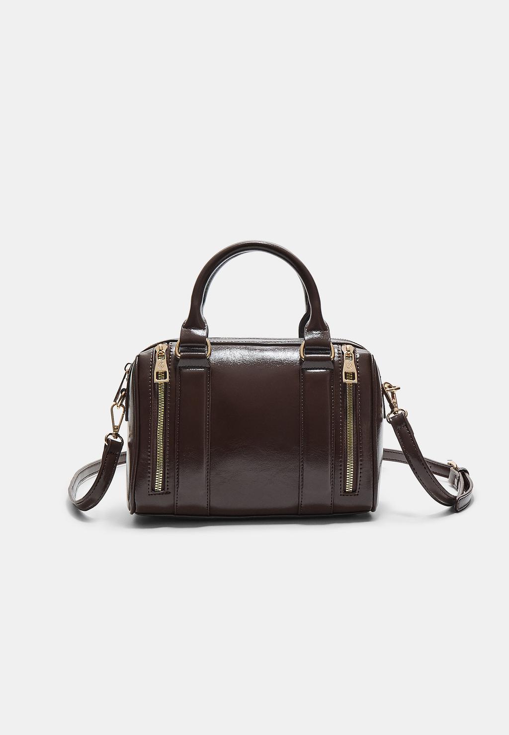 Borsa finta pelle con cerniere