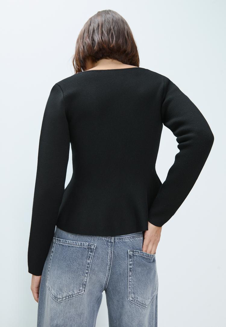 chaqueta peplum punto botones