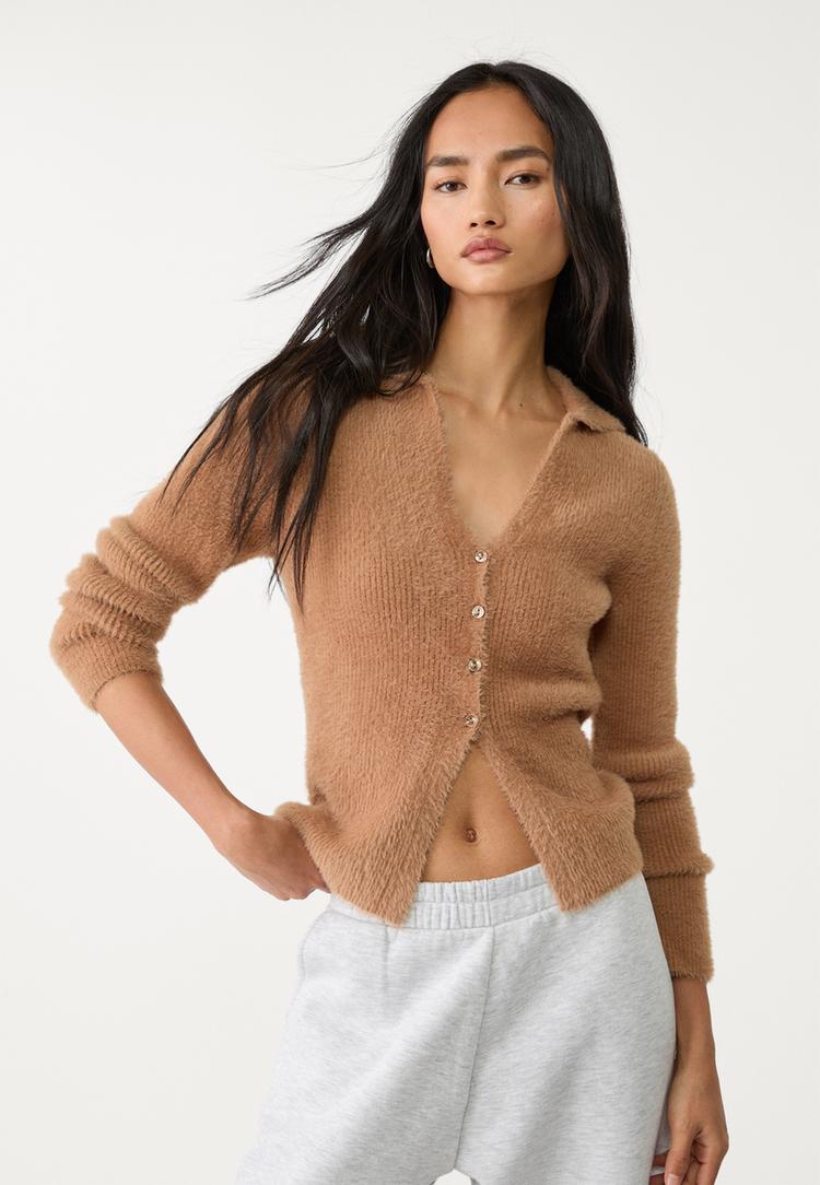 veste avec boutons en fausse fourrure
