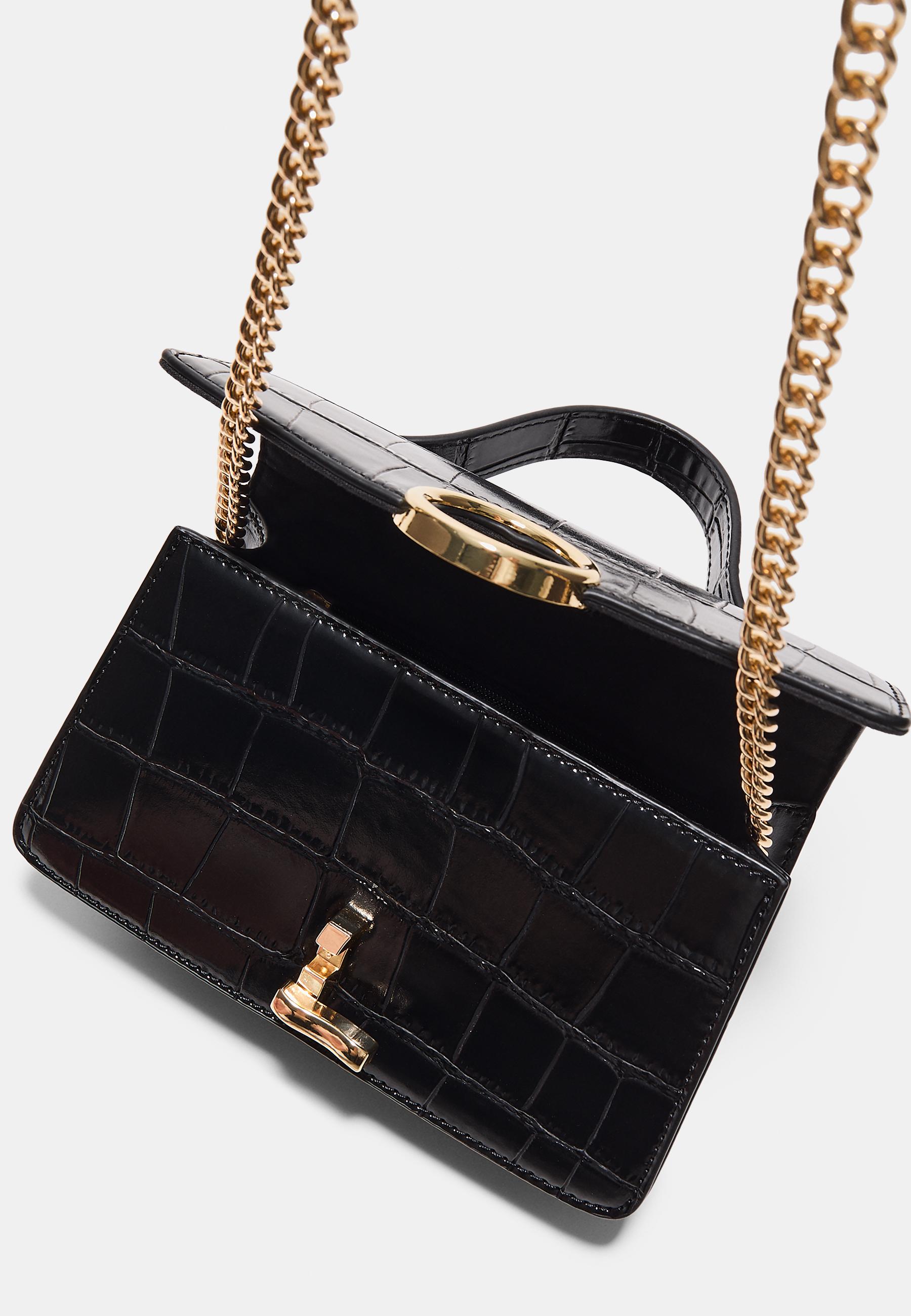 Coconut effect round clasp shoulder bag — Black