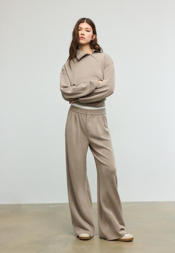 felpa con cerniera laterale effetto morbido