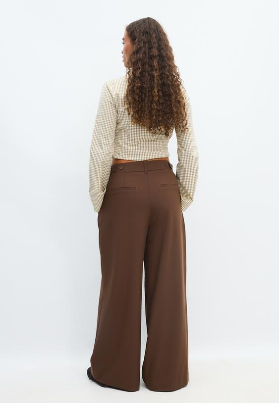pantaloni eleganti wide leg con bottoni regolabili