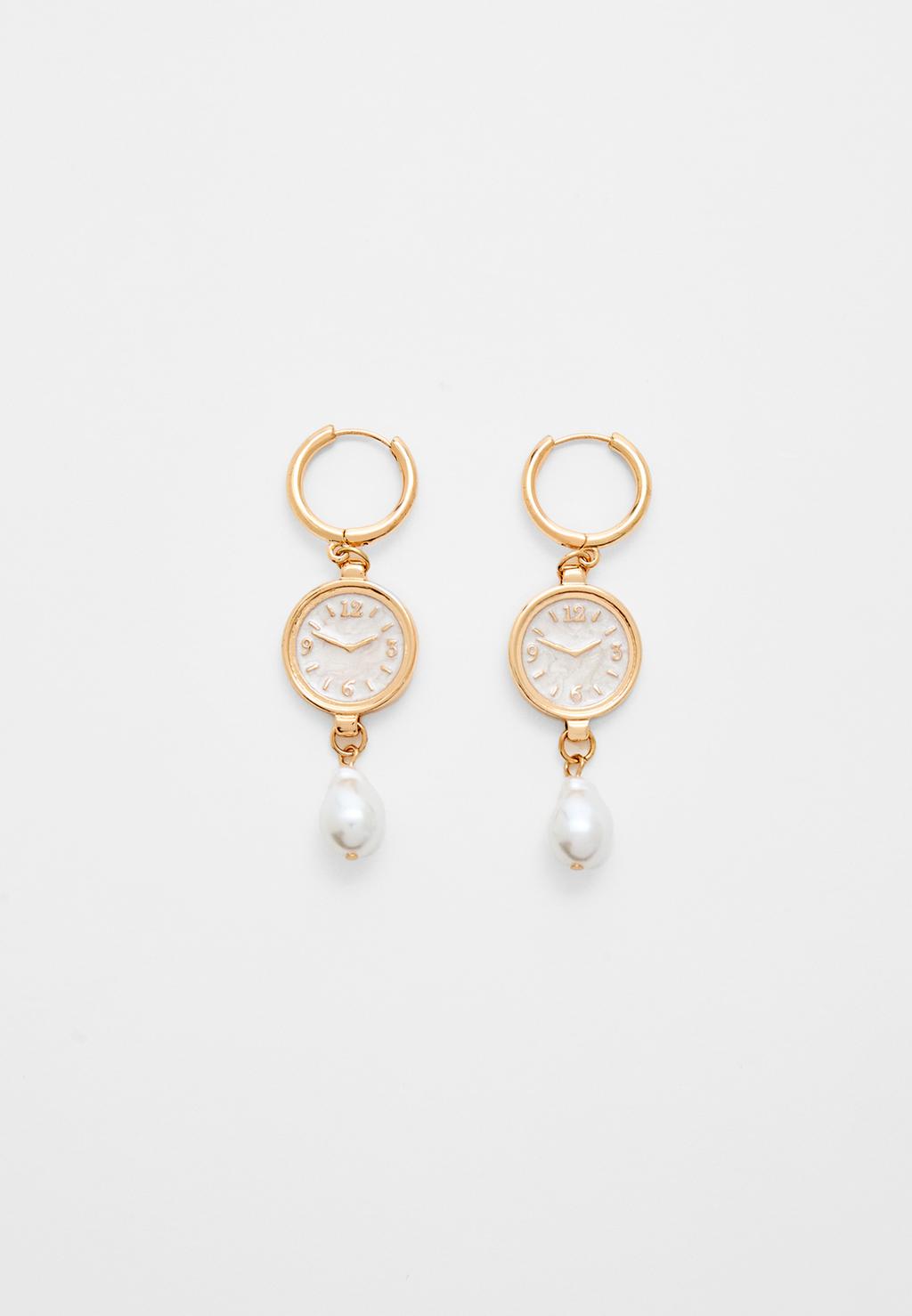 Watch and faux pearl earrings