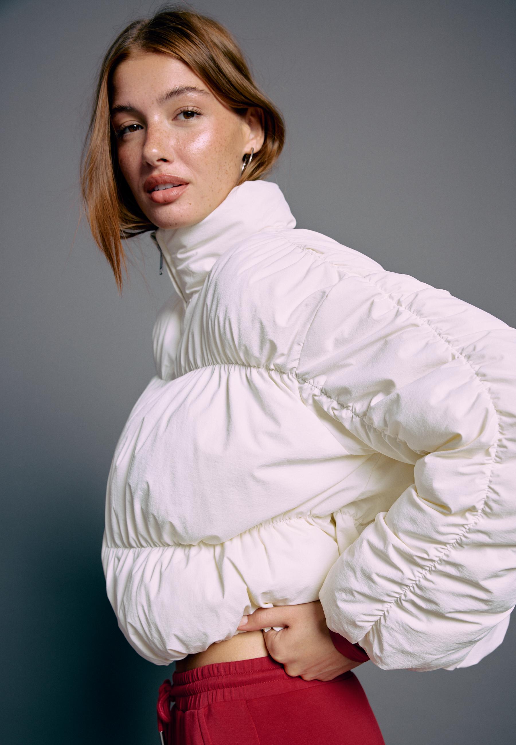 Padded jacket with high neck and gathered detail — Ecru
