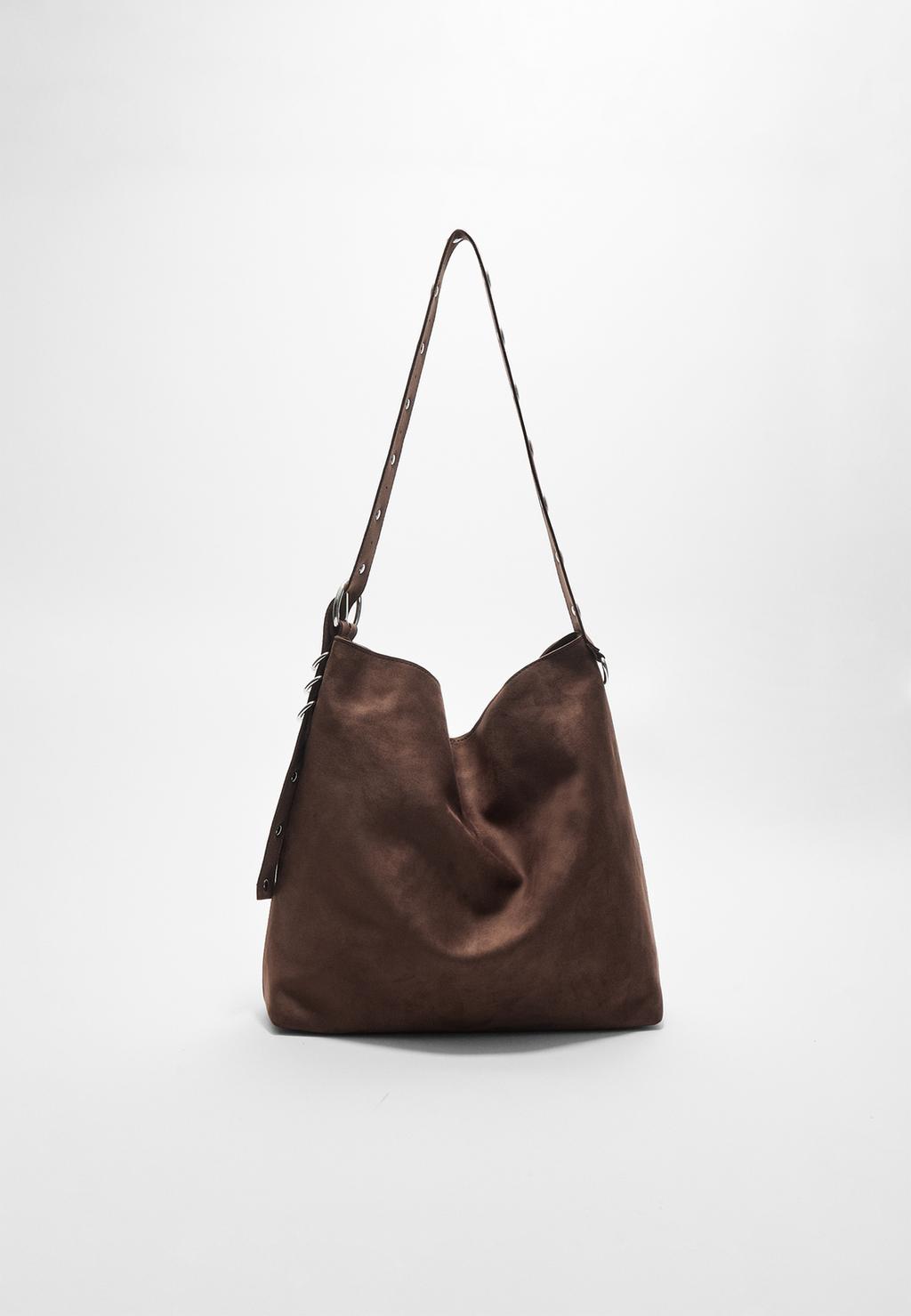 Faux suede bucket bag with strap detail