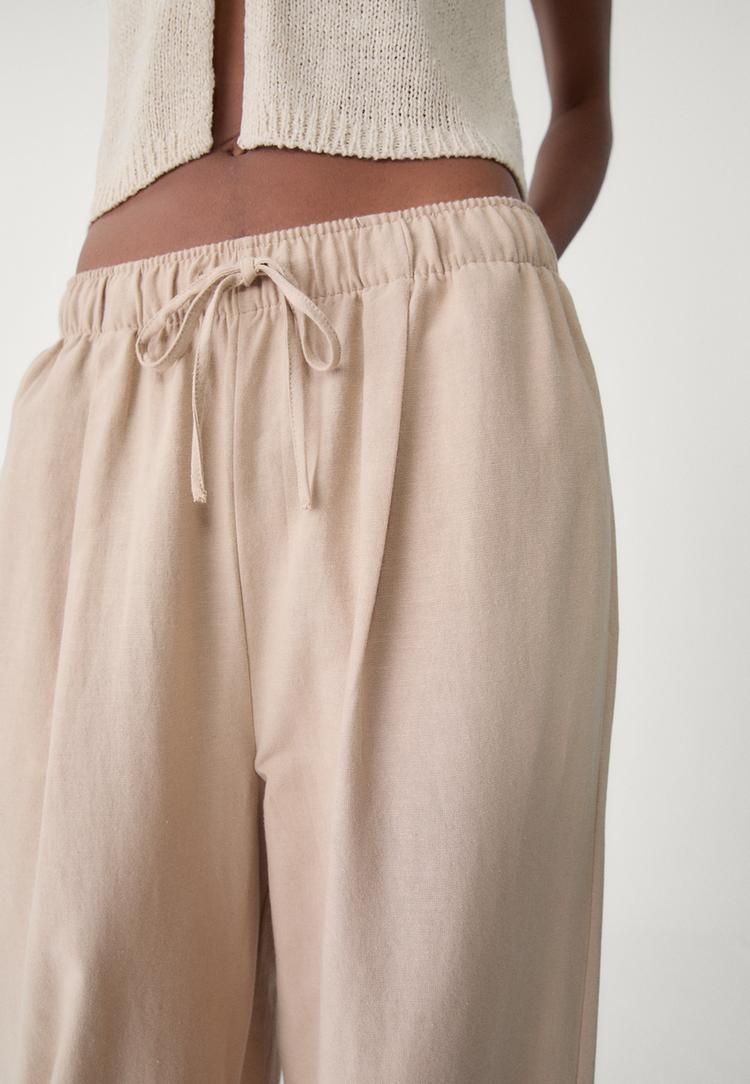 pantalon wide leg con lino